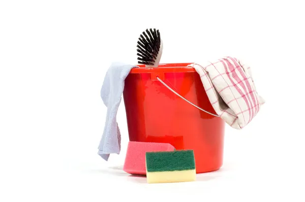 Red bucket with cleaning tools Royalty Free Stock Photos