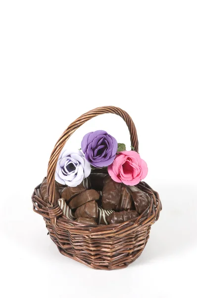 Basket filled with chocolate and rose Royalty Free Stock Images