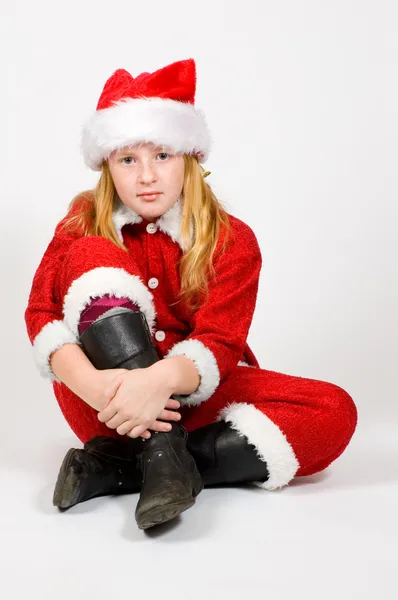 Noel Baba olarak giymiş küçük bir kız — Stok fotoğraf
