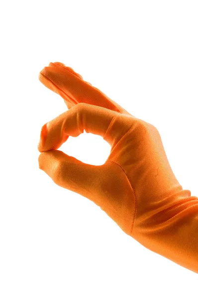 Χέρι σε πορτοκαλί γάντι κάνει εντάξει σημαδιού — Φωτογραφία Αρχείου