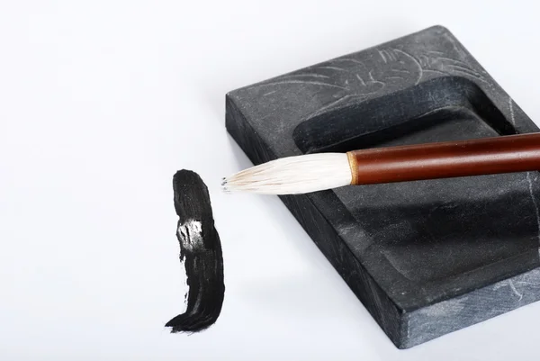 Cepillo de caligrafía asiática en piedra tinta —  Fotos de Stock