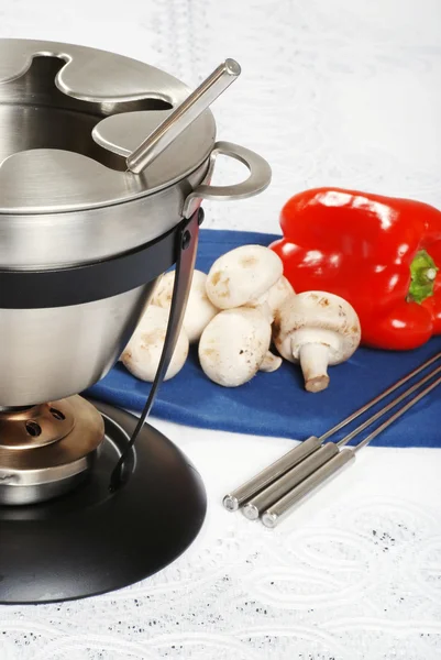 Close-up van olie fondue met fruit — Stockfoto
