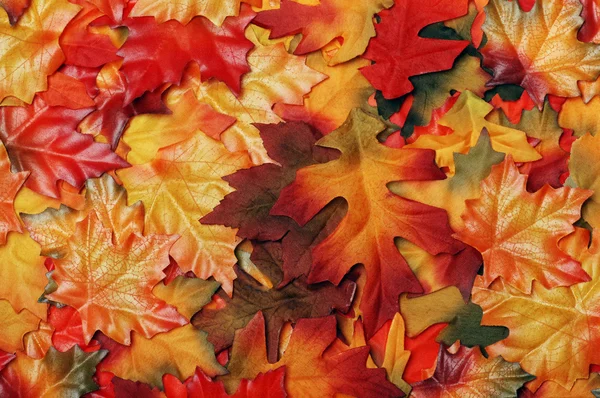 Fake colorful fall leaves — Stock Photo, Image