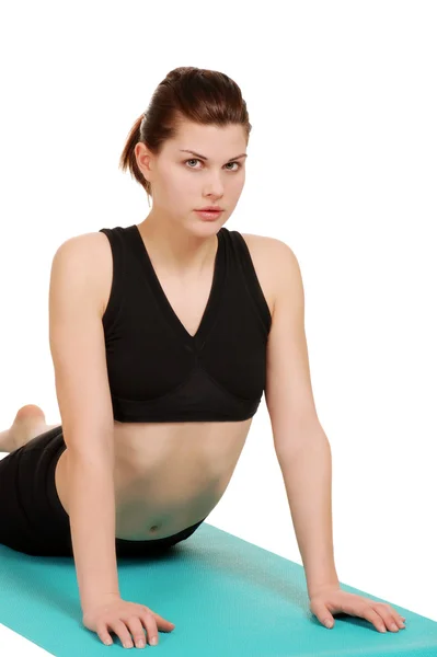 Young woman doing back stretch — Stock Photo, Image