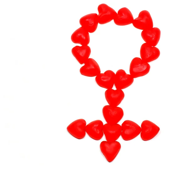 Candy hearts making Female symbol — Stock Photo, Image