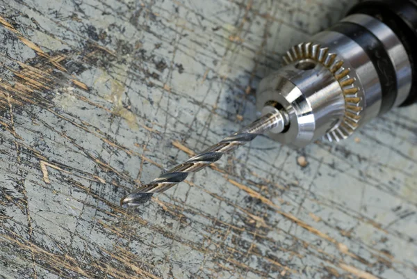 Close up of a drill bit with drill — Stock Photo, Image