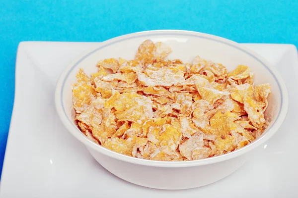 Closeup bowl of flaky cereal — Stock Photo, Image