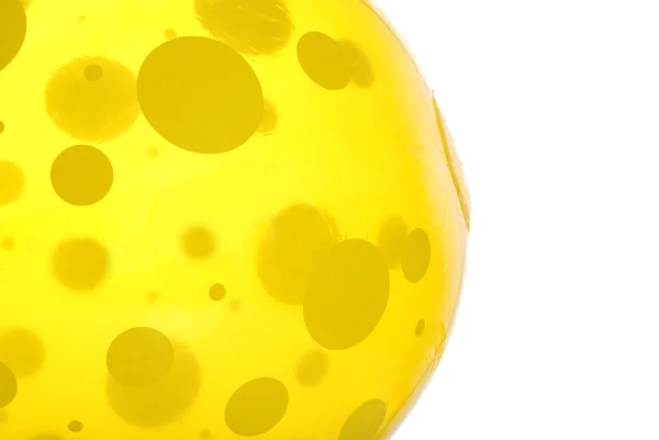 Closeup yellow poka dot beach ball — Stock Photo, Image