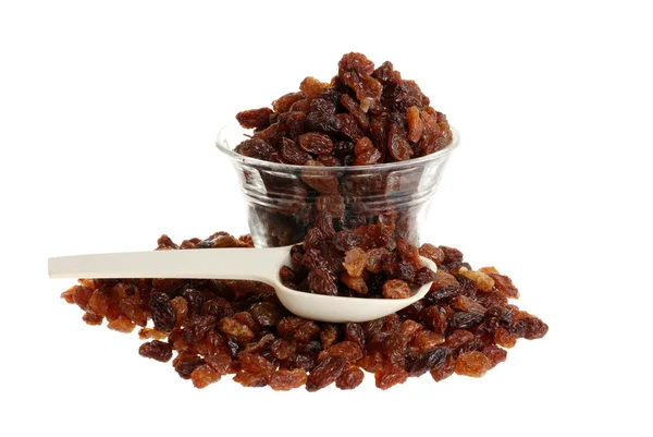 Raisins con ciotola e cucchiaio dosatore — Foto Stock