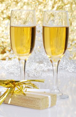 Champagne with a gift clipart