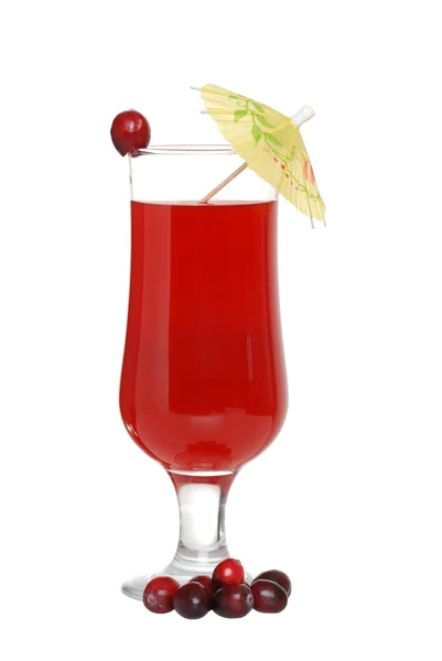Cranberry juice with cranberries and umbrella — Stock Photo, Image