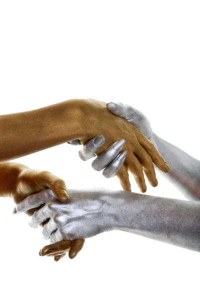 Gold and silver hands — Stock Photo, Image