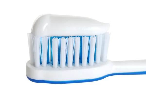 Macro toothbrush with paste shallow DOF — Stock Photo, Image