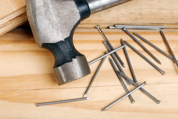 Closeup of hammer and nails — Stock Photo, Image