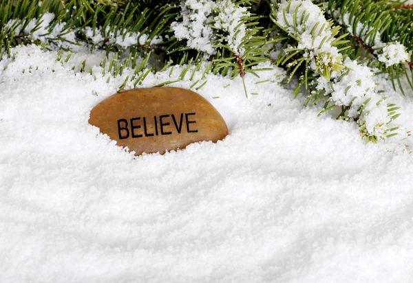 Snow with believe stone — Stock Photo, Image