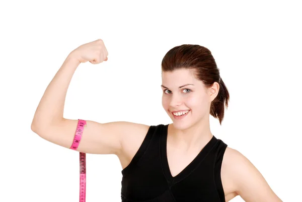 Mujer midiendo su bíceps —  Fotos de Stock