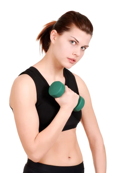 Young woman with green free weight — Stock Photo, Image