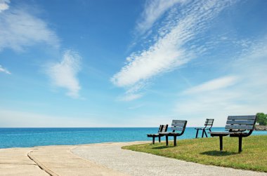 Row of park benches clipart