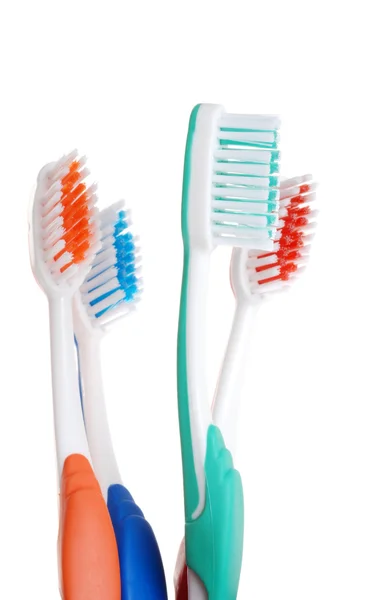 Closeup colorful toothbrush focus on green one — Stock Photo, Image