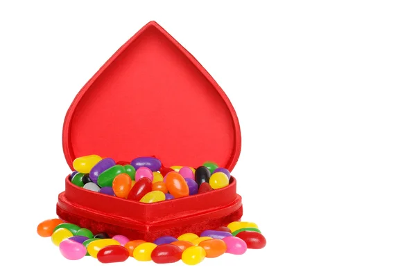 Un sacco di gelatine in una scatola di cuore rosso — Foto Stock