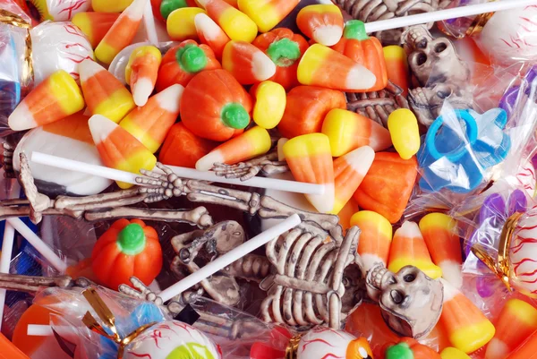 Assortiti caramelle di Halloween e giocattoli — Foto Stock