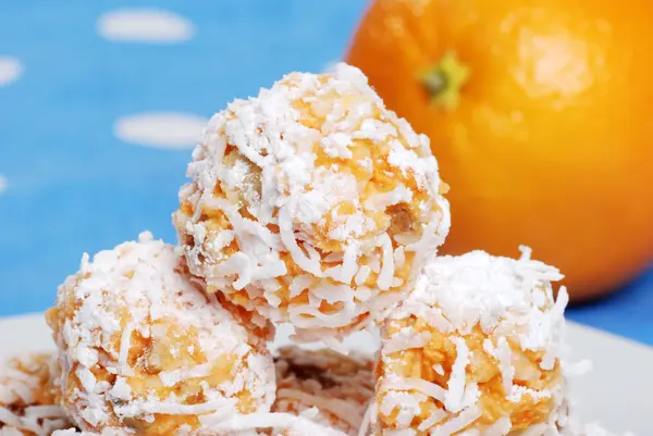 Macro of orange snowball cookies — Stock Photo, Image