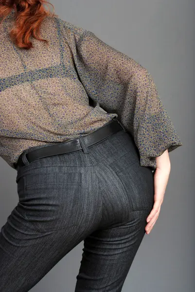 Woman behind wearing jeans — Stock Photo, Image