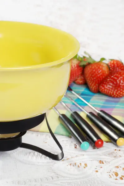 Yellow fondue set — Stock Photo, Image