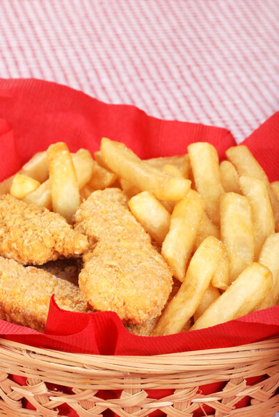 Closeup chicken fingers and french fries