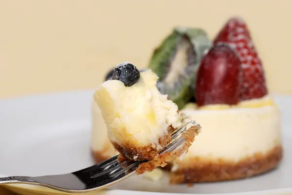 Fruit cheese cake on a fork — Stock Photo, Image