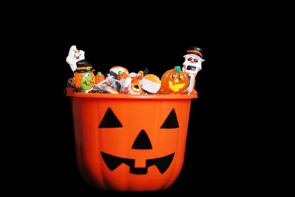 Halloween candy in pumpkin — Stock Photo, Image