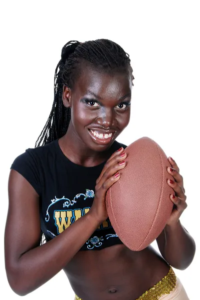 Sexy female holding a football — Stock Photo, Image