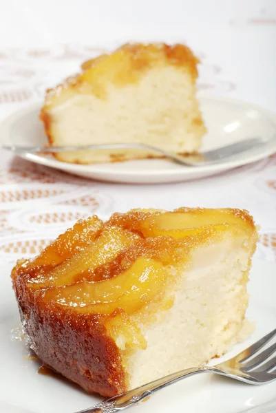 Two slices of upside down pear cake