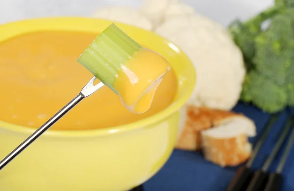 Celery dipped in cheese — Stock Photo, Image