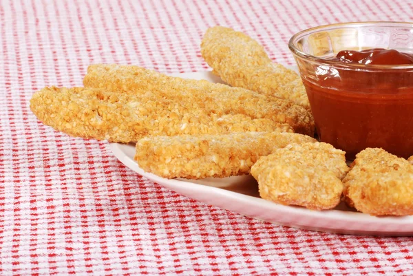 Chicken fingers focus on bowl — Stock Photo, Image