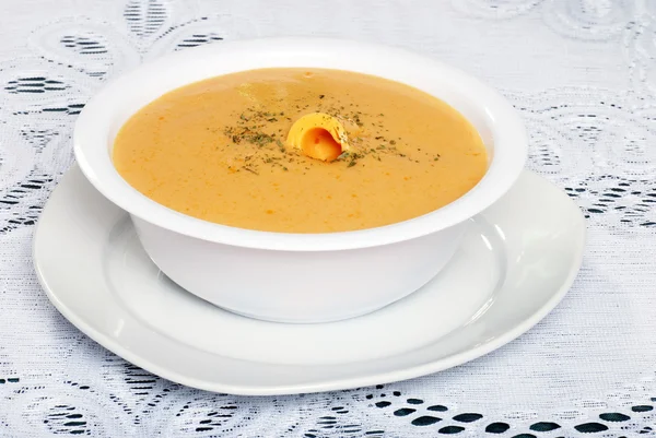Cheddar cheese soup with garnish — Stock Photo, Image