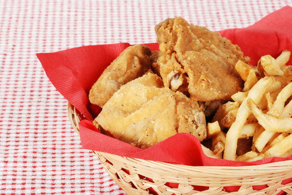 Closeup fried chicken and french fries