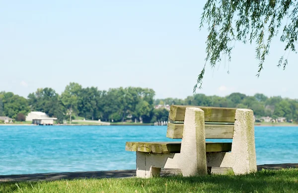 Quite bench by the river — Stock Photo, Image