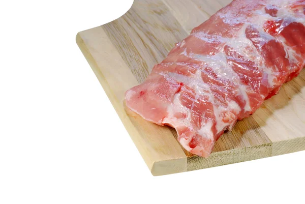 Raw spare ribs on cutting board — Stock Photo, Image