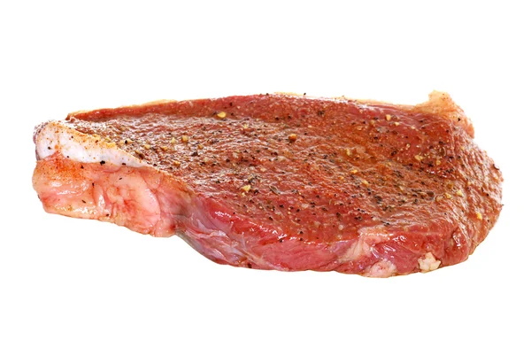 Nyers fűszerezett kerek steak — Stock Fotó