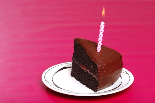 Single serving of birthday cake with candle — Stock Photo, Image