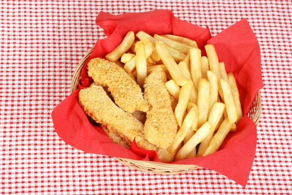 Top vista dedos de frango e batatas fritas — Fotografia de Stock