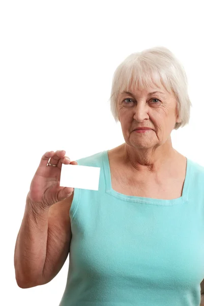 Senior lady holding a blank card — Stock Photo, Image