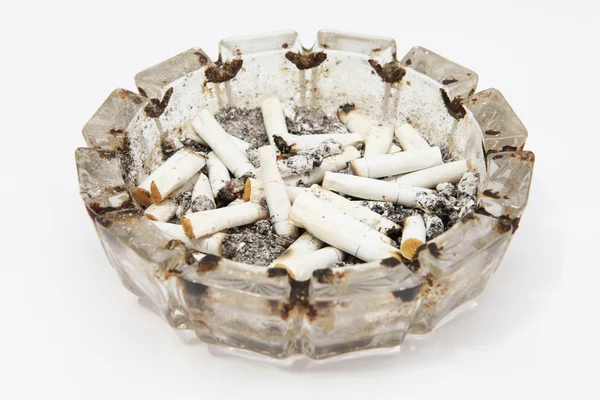 stock image A lot of smoke ashtray on a white backgr