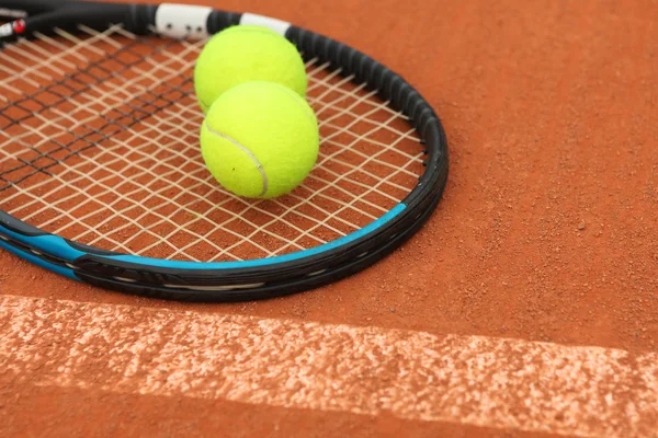 Тенісний м'яч на тенісному корті Стокова Картинка