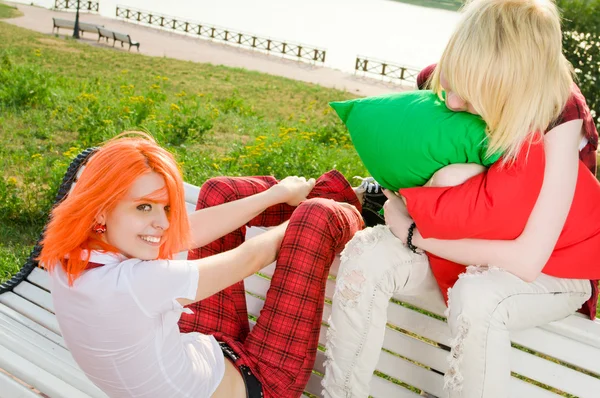 Two teenage girls have fun at the summer park — Stock Photo, Image