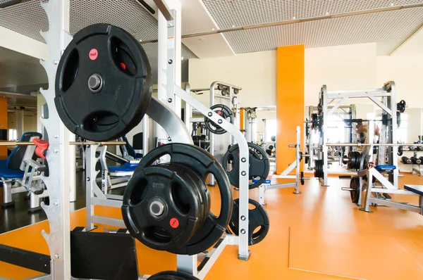 Interior of a health club with some exercise equipment — Stock Photo, Image