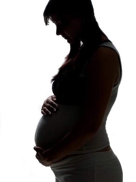 Hamile bir kadının silueti. — Stok fotoğraf