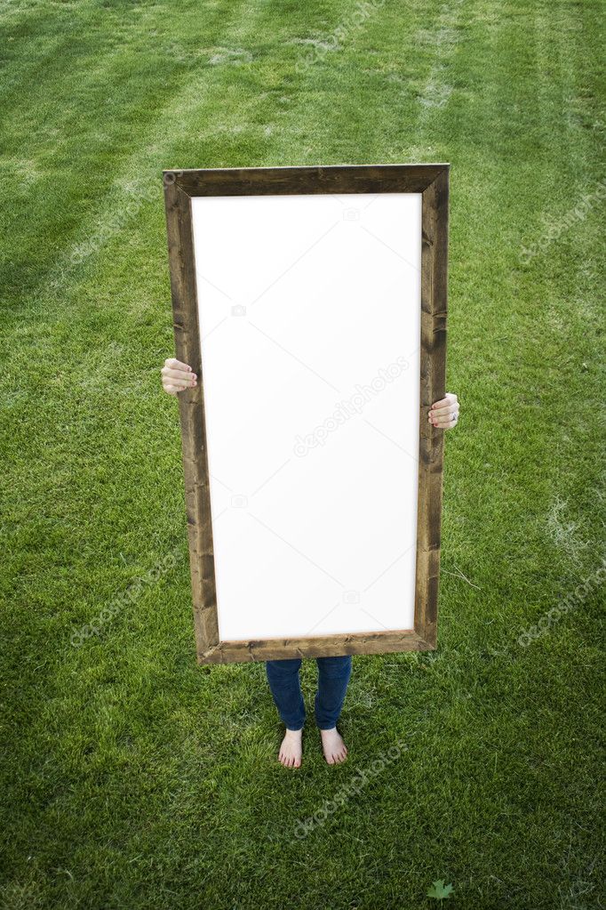 Woman Holding Blank Rectangular Frame