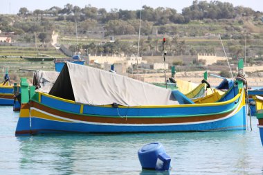Traditional maltese fishing boat clipart